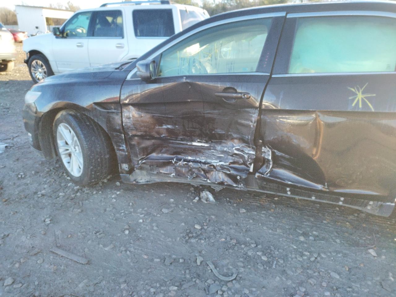 Photo 9 from auction – 2013 FORD TAURUS SEL with VIN 1FAHP2E83DG188637