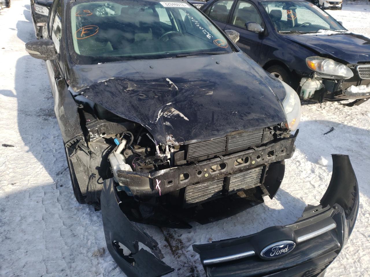Photo 9 from auction – 2014 FORD FOCUS SE with VIN 1FADP3K23EL121615
