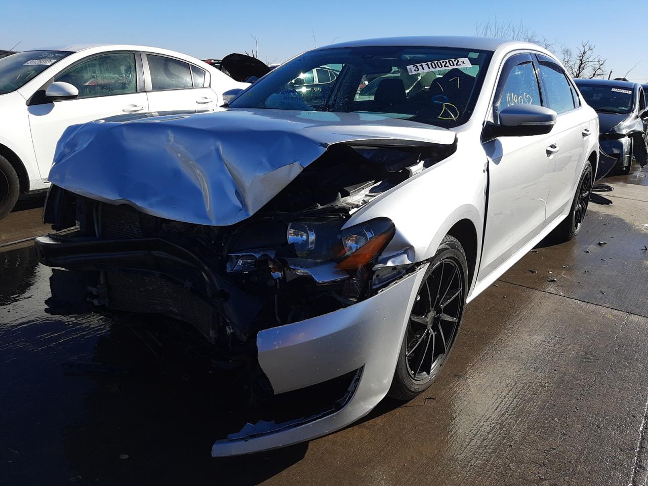 Photo 2 from auction – 2014 VOLKSWAGEN PASSAT S with VIN 1VWAT7A33EC033218