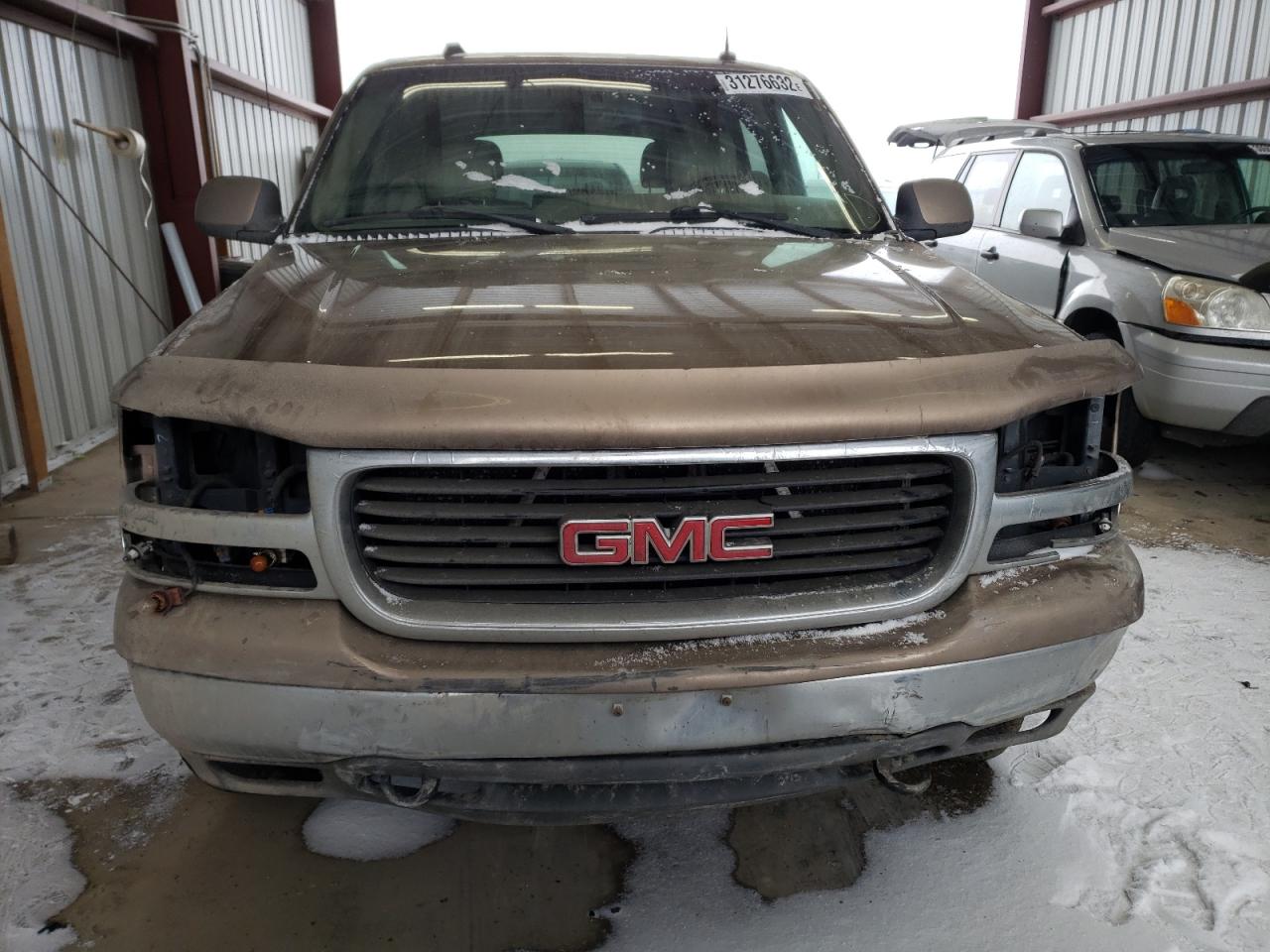 Photo 9 from auction – 2004 GMC YUKON with VIN 1GKEK13Z74R118746