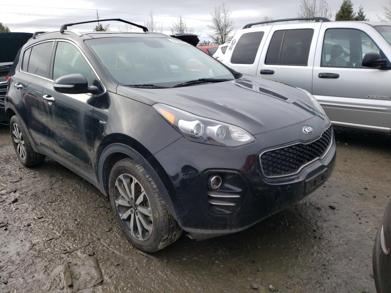 KIA SPORTAGE E 2017 with VIN KNDPNCAC8H7204980 - Photo from auction