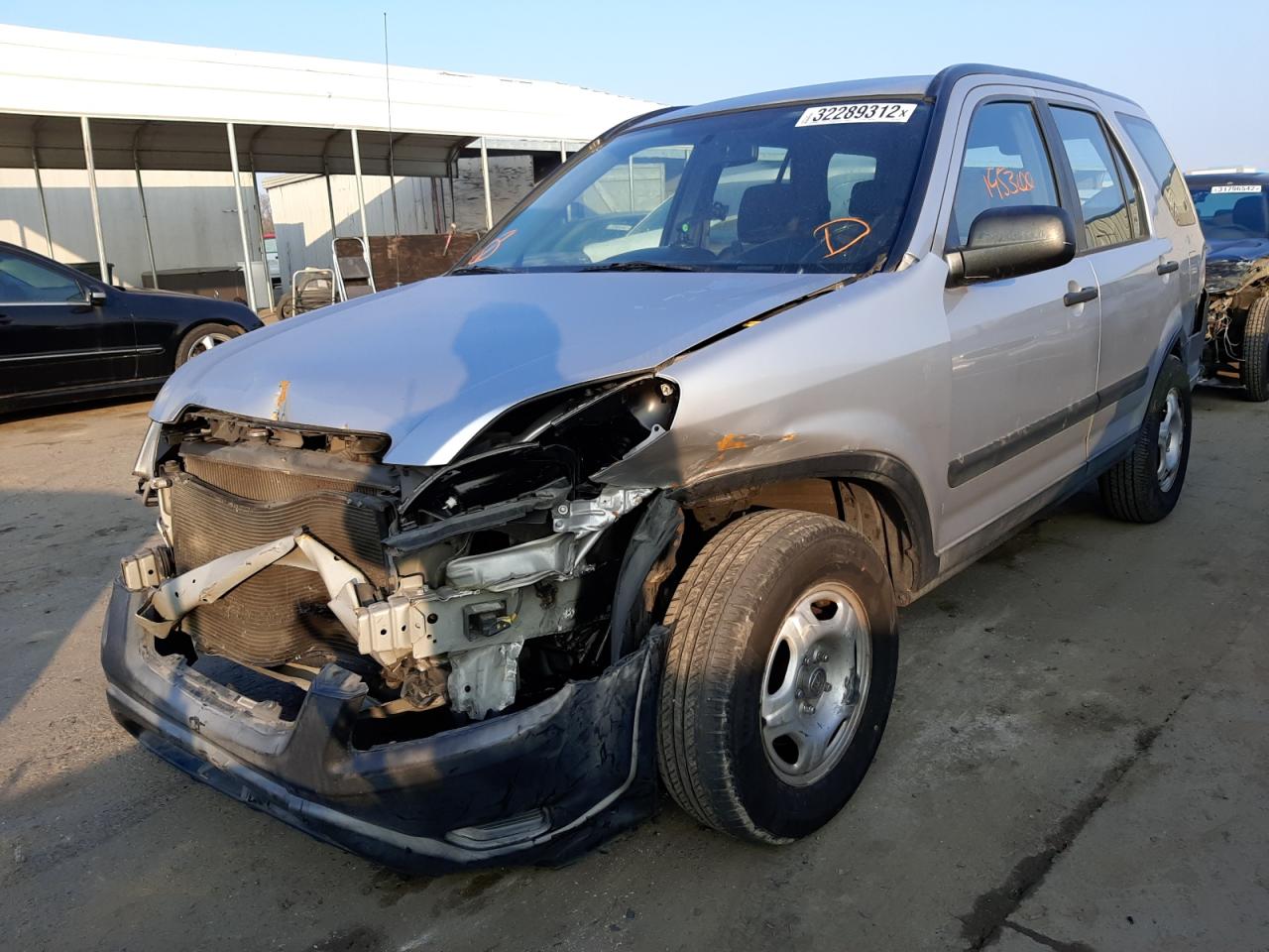 Photo 2 from auction – 2003 HONDA CR-V LX with VIN JHLRD68483C014613