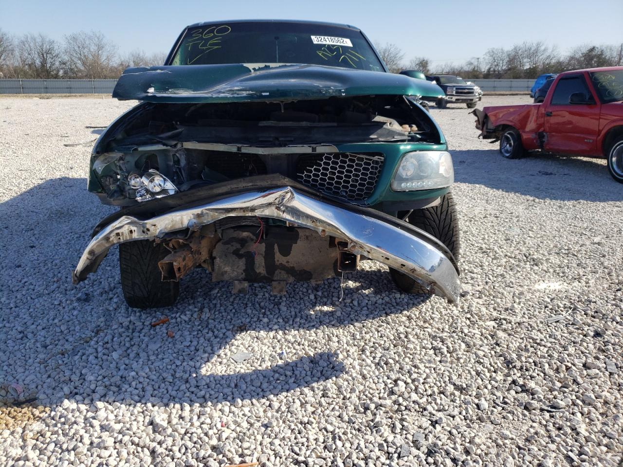Photo 9 from auction – 1999 FORD F150 with VIN 1FTRX17W3XNA23711