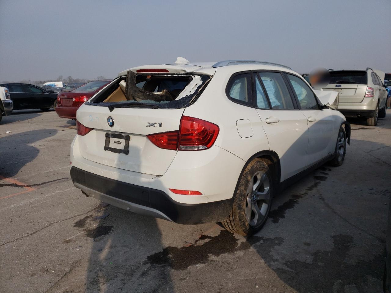 Photo 4 from auction – 2015 BMW X1 SDRIVE2 with VIN WBAVM1C52FVW57091