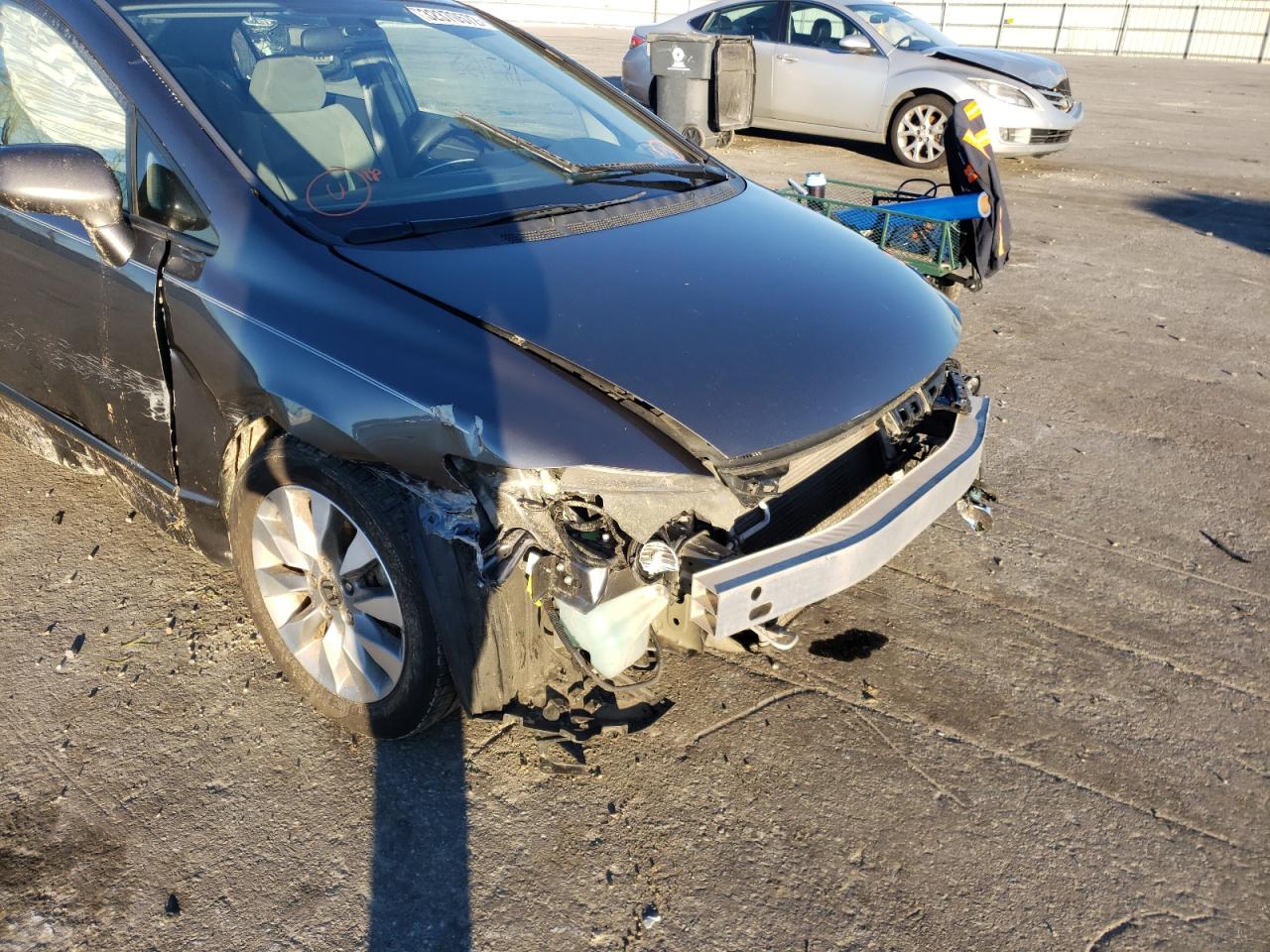 Photo 9 from auction – 2011 HONDA CIVIC EX with VIN 19XFA1F84BE013984