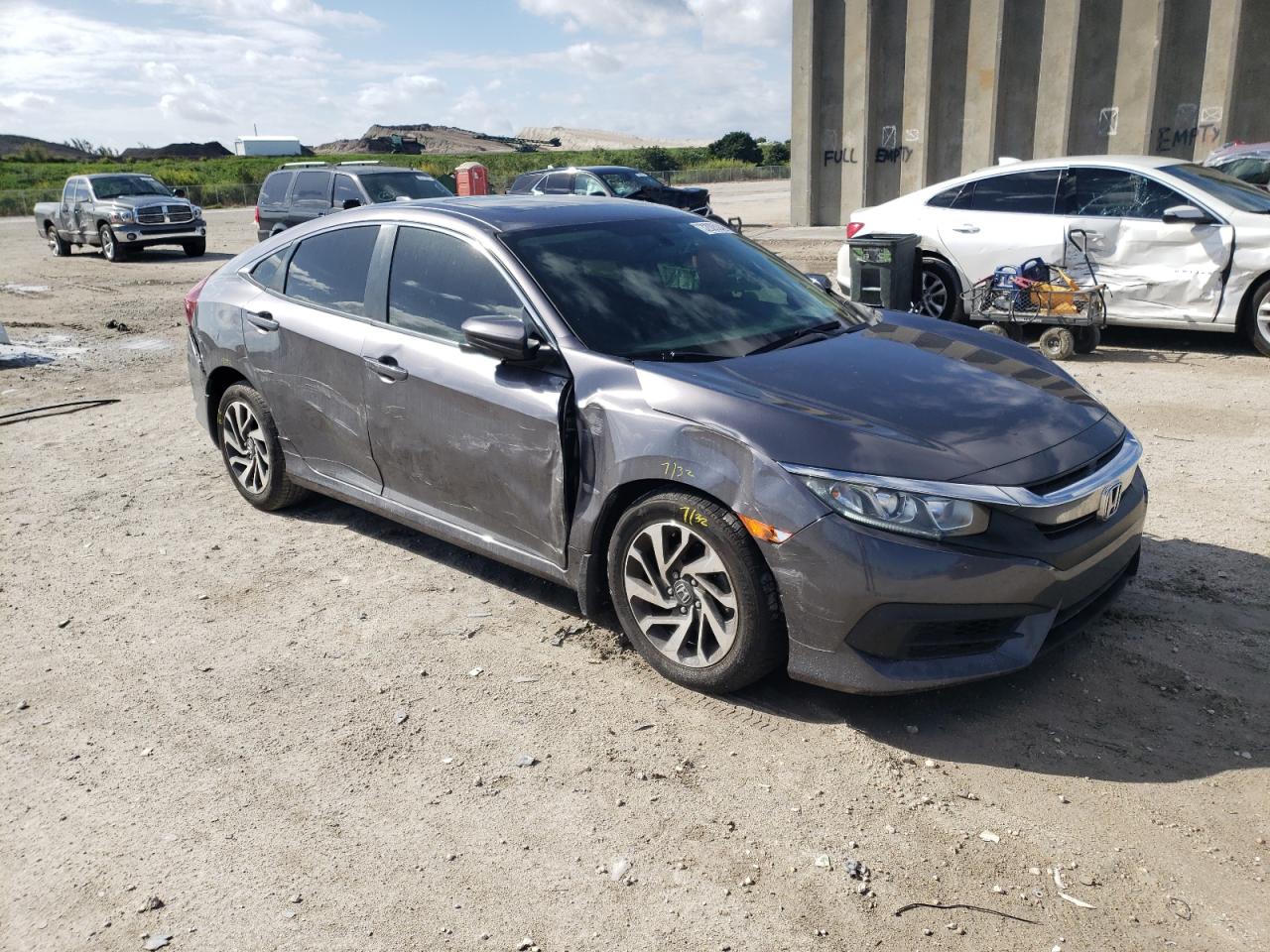 HONDA CIVIC EX 2017 with VIN 19XFC2F72HE082592 - Photo from auction