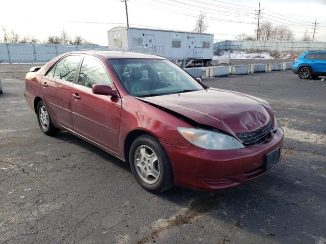 TOYOTA CAMRY LE 2002 with VIN 4T1BF32K72U015450 - Photo from auction