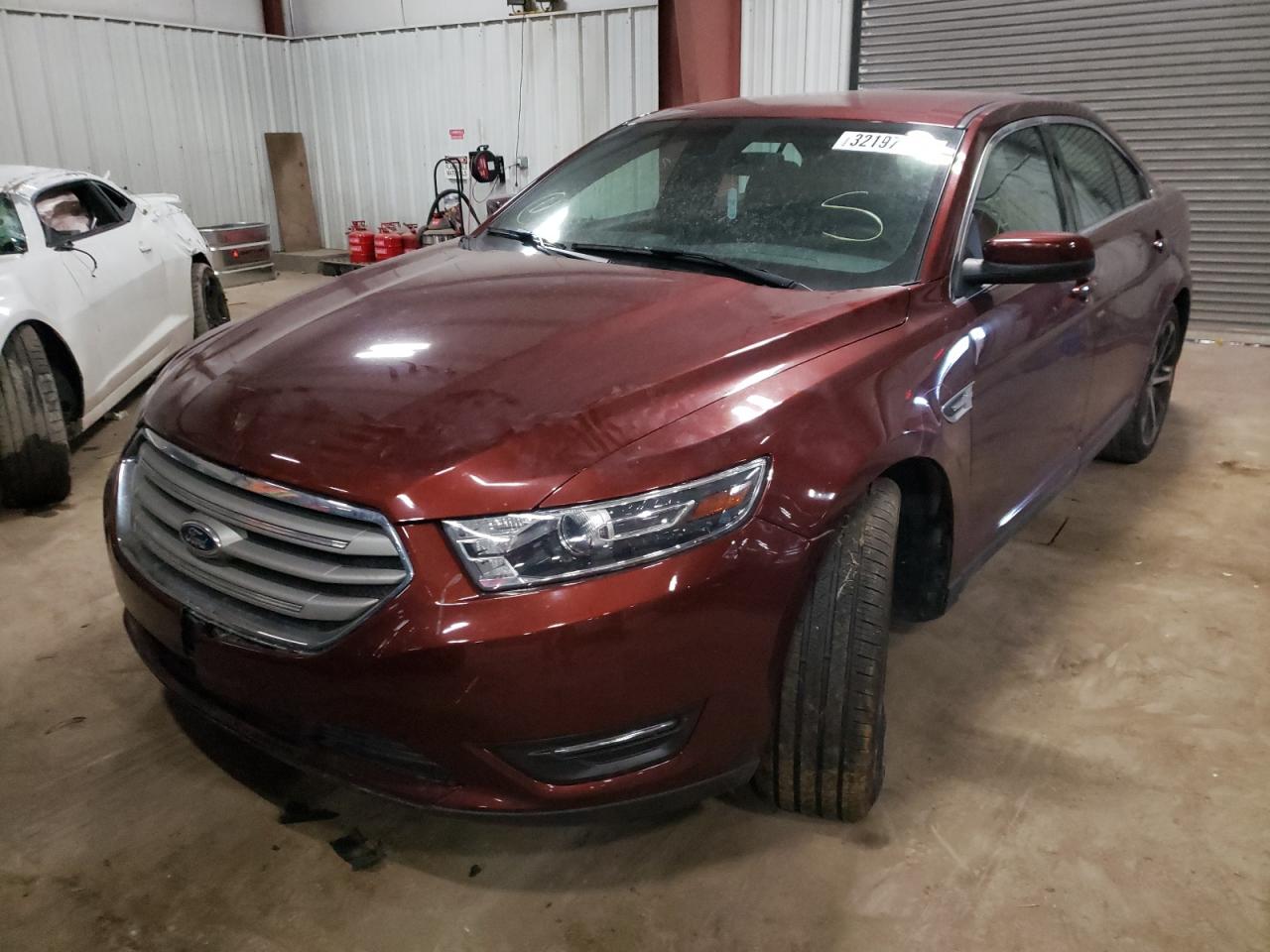 Photo 2 from auction – 2015 FORD TAURUS SEL with VIN 1FAHP2E83FG161554