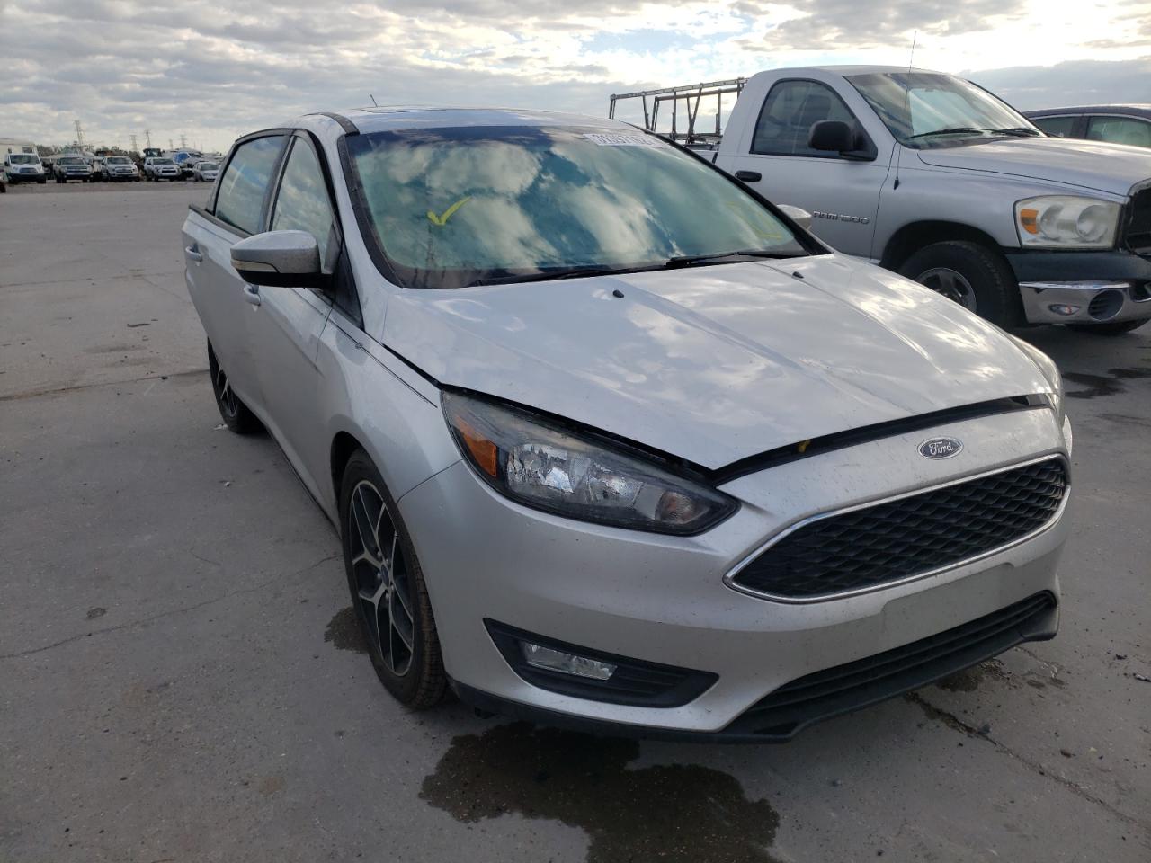 FORD FOCUS SEL 2017 with VIN 1FADP3H21HL202057 - Photo from auction