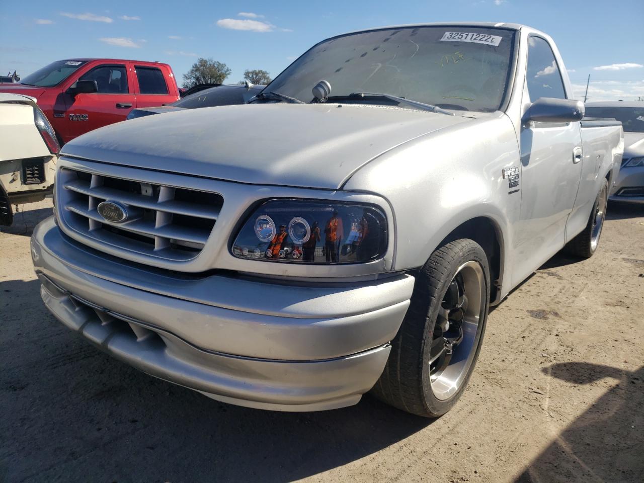 Photo 2 from auction – 2003 FORD F150 with VIN 2FTRF17L33CA44602