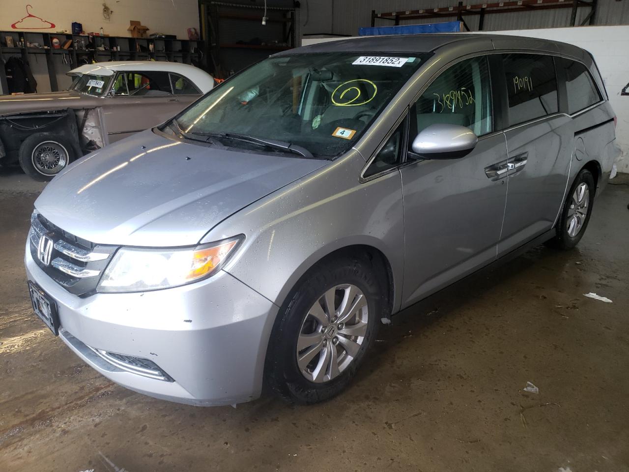 Photo 2 from auction – 2016 HONDA ODYSSEY EX with VIN 5FNRL5H45GB059852