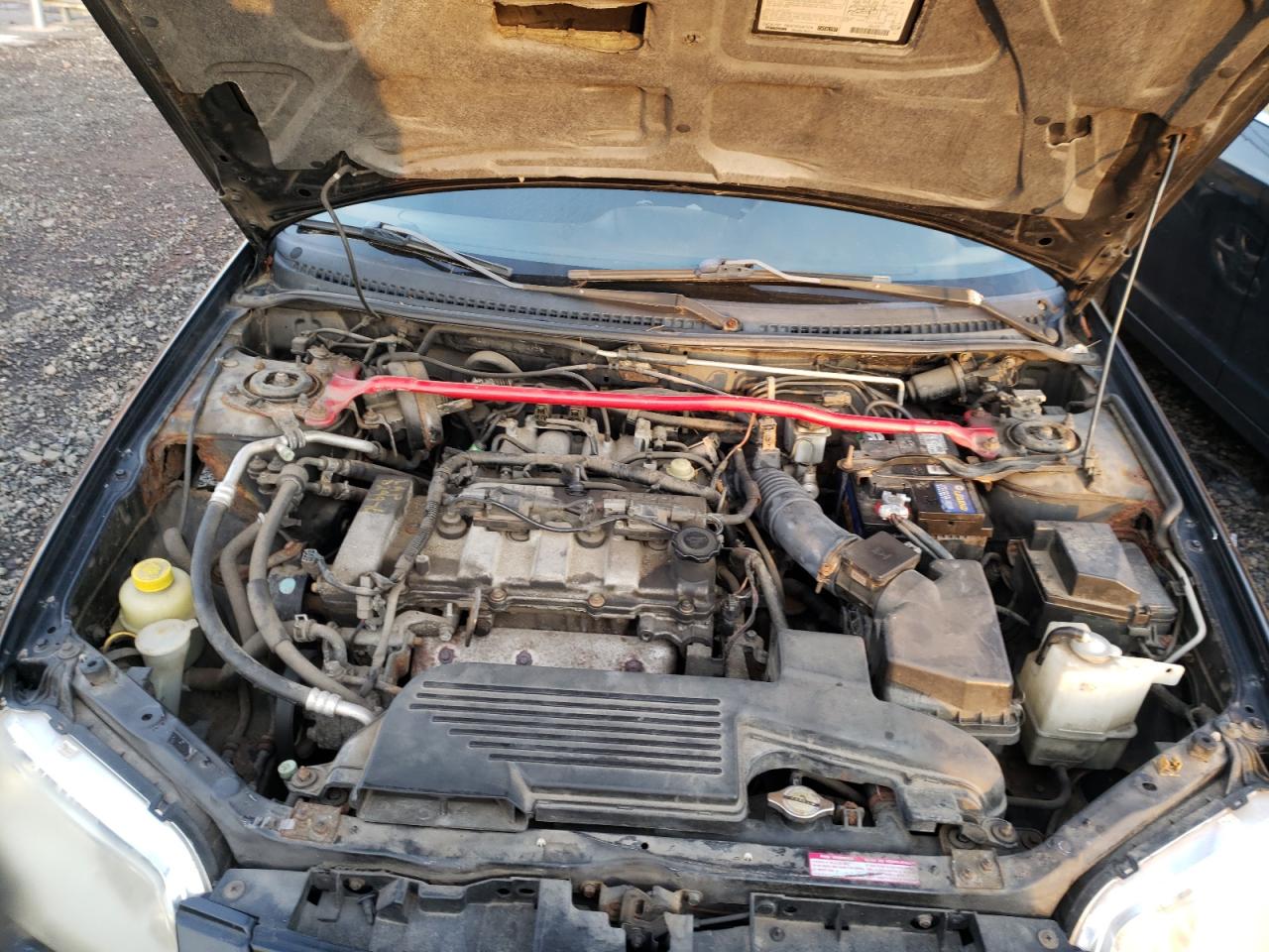 Photo 7 from auction – 2002 MAZDA PROTEGE PR with VIN JM1BJ245721589956