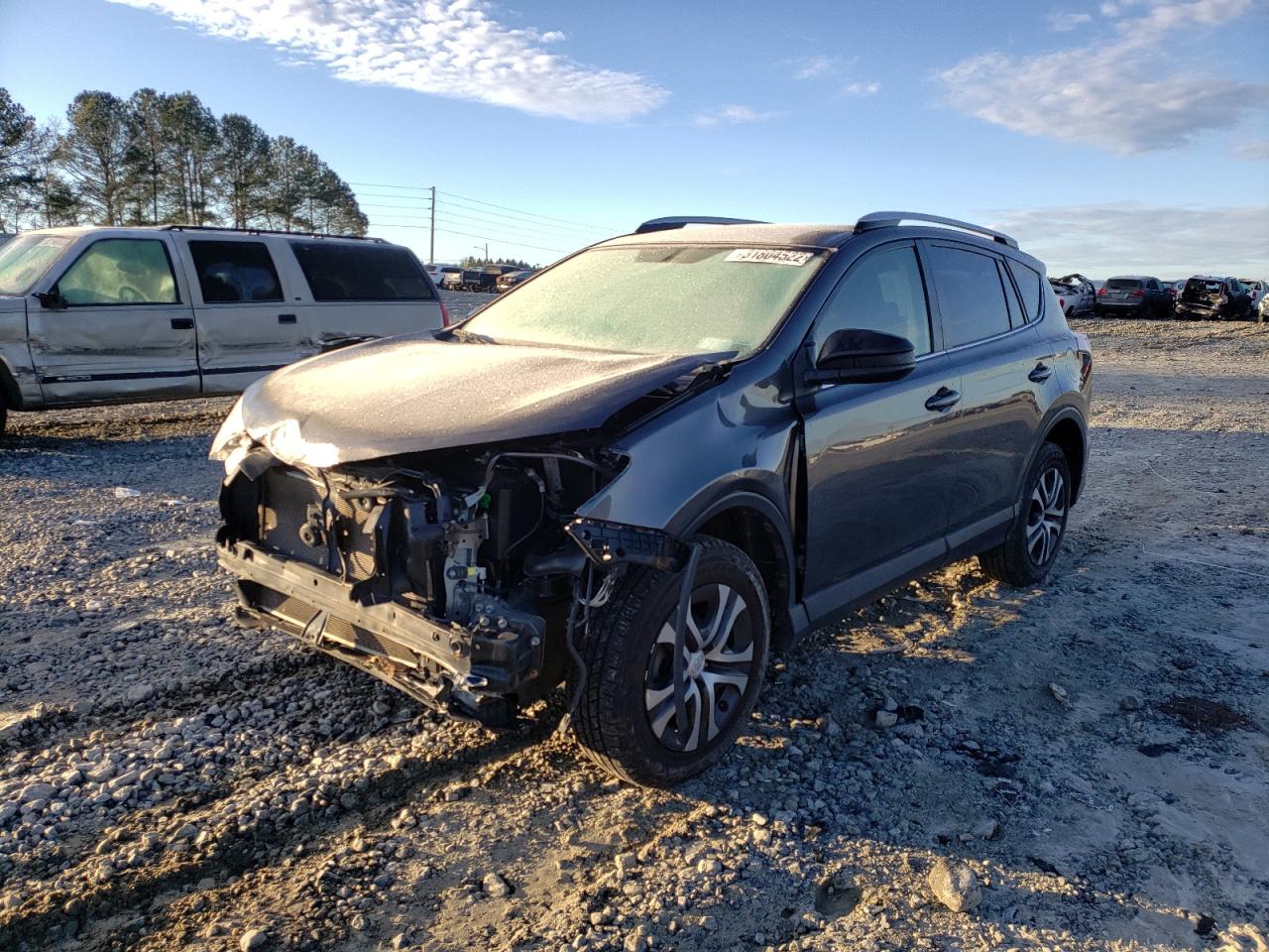 Photo 2 from auction – 2016 TOYOTA RAV4 LE with VIN JTMBFREV4GJ051795