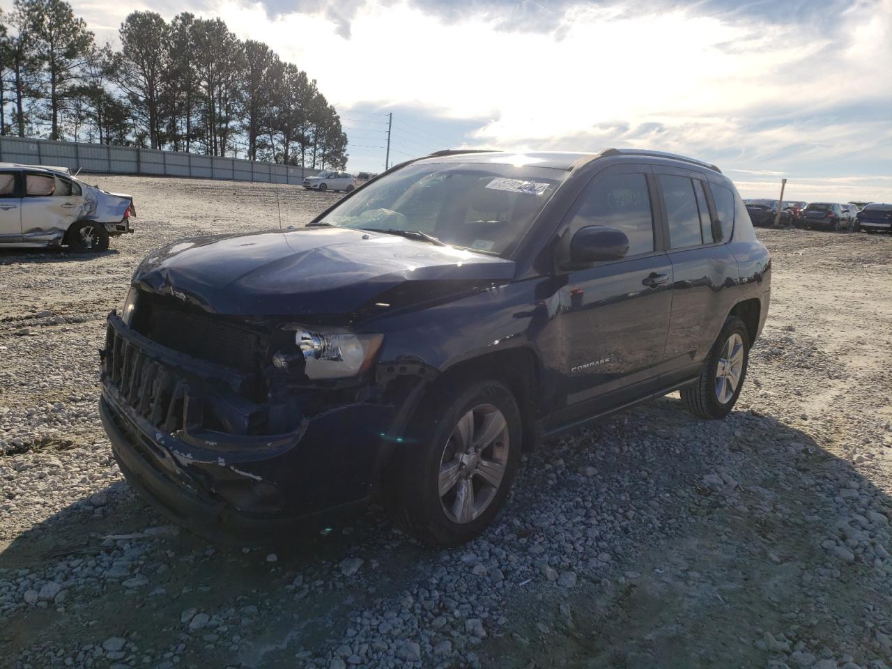 Photo 2 from auction – 2014 JEEP COMPASS LA with VIN 1C4NJCEAXED642926