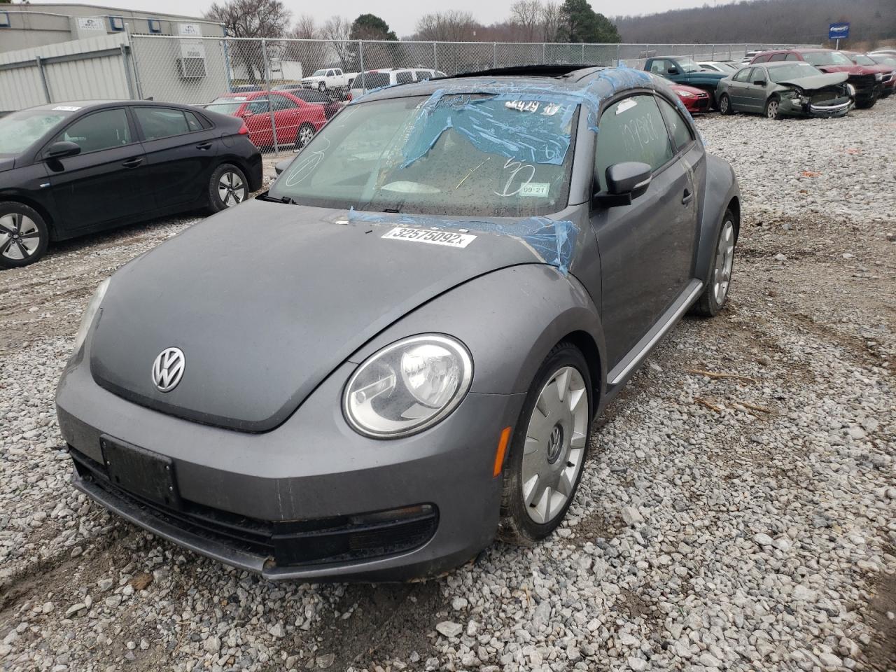 Photo 2 from auction – 2012 VOLKSWAGEN BEETLE with VIN 3VWJP7AT7CM611319