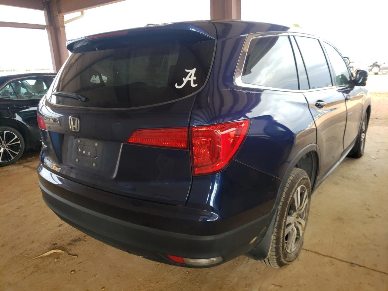 Photo 4 from auction – 2016 HONDA PILOT EXLN with VIN 5FNYF5H7XGB029369
