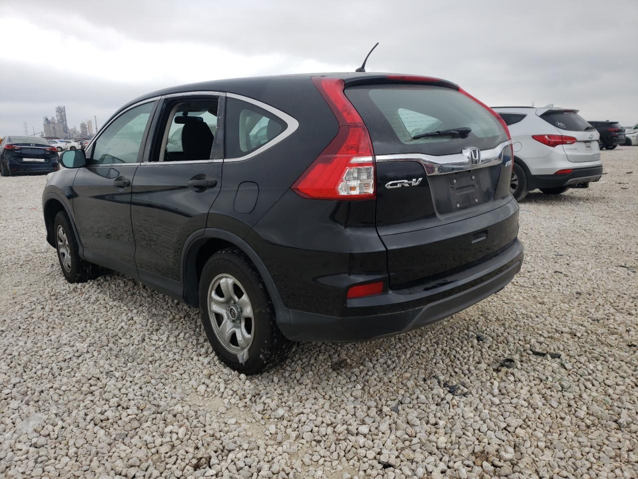Photo 3 from auction – 2015 HONDA CR-V LX with VIN 5J6RM4H31FL021281