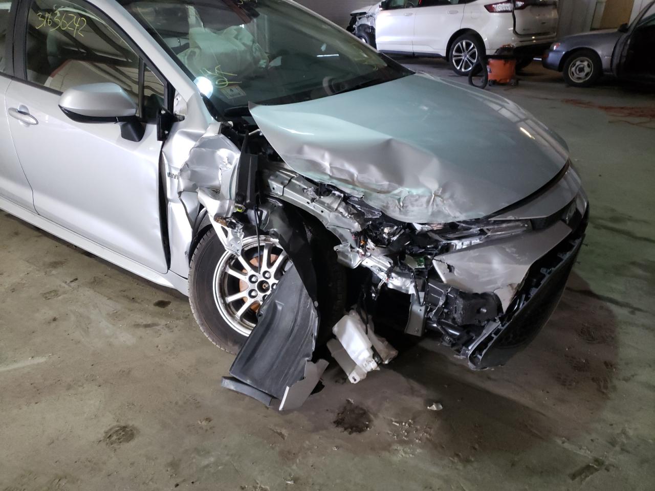 Photo 9 from auction – 2021 TOYOTA COROLLA LE with VIN JTDEAMDE1MJ020483