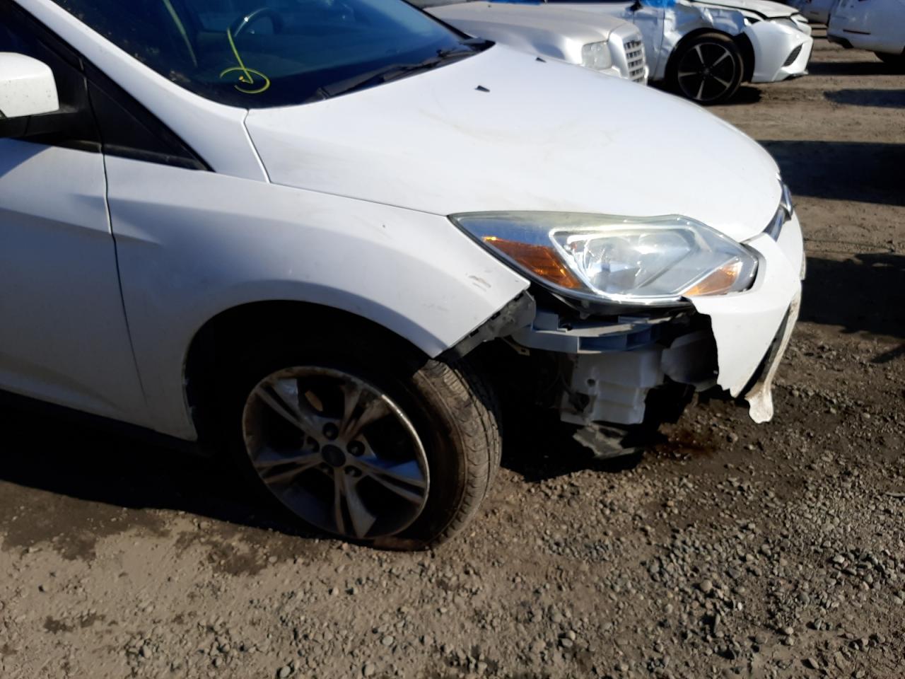 Photo 9 from auction – 2014 FORD FOCUS SE with VIN 1FADP3F29EL260545