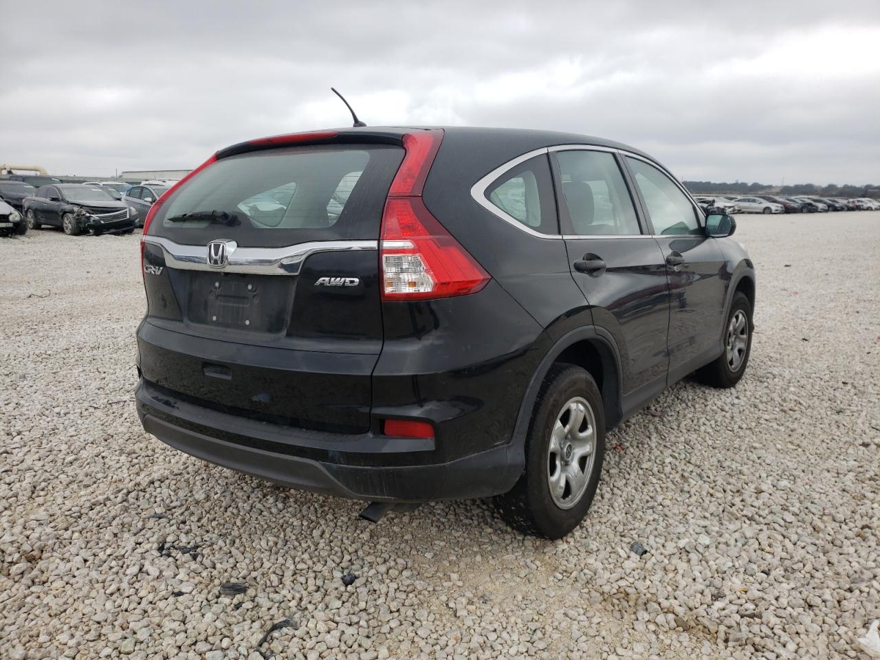 Photo 4 from auction – 2015 HONDA CR-V LX with VIN 5J6RM4H31FL021281