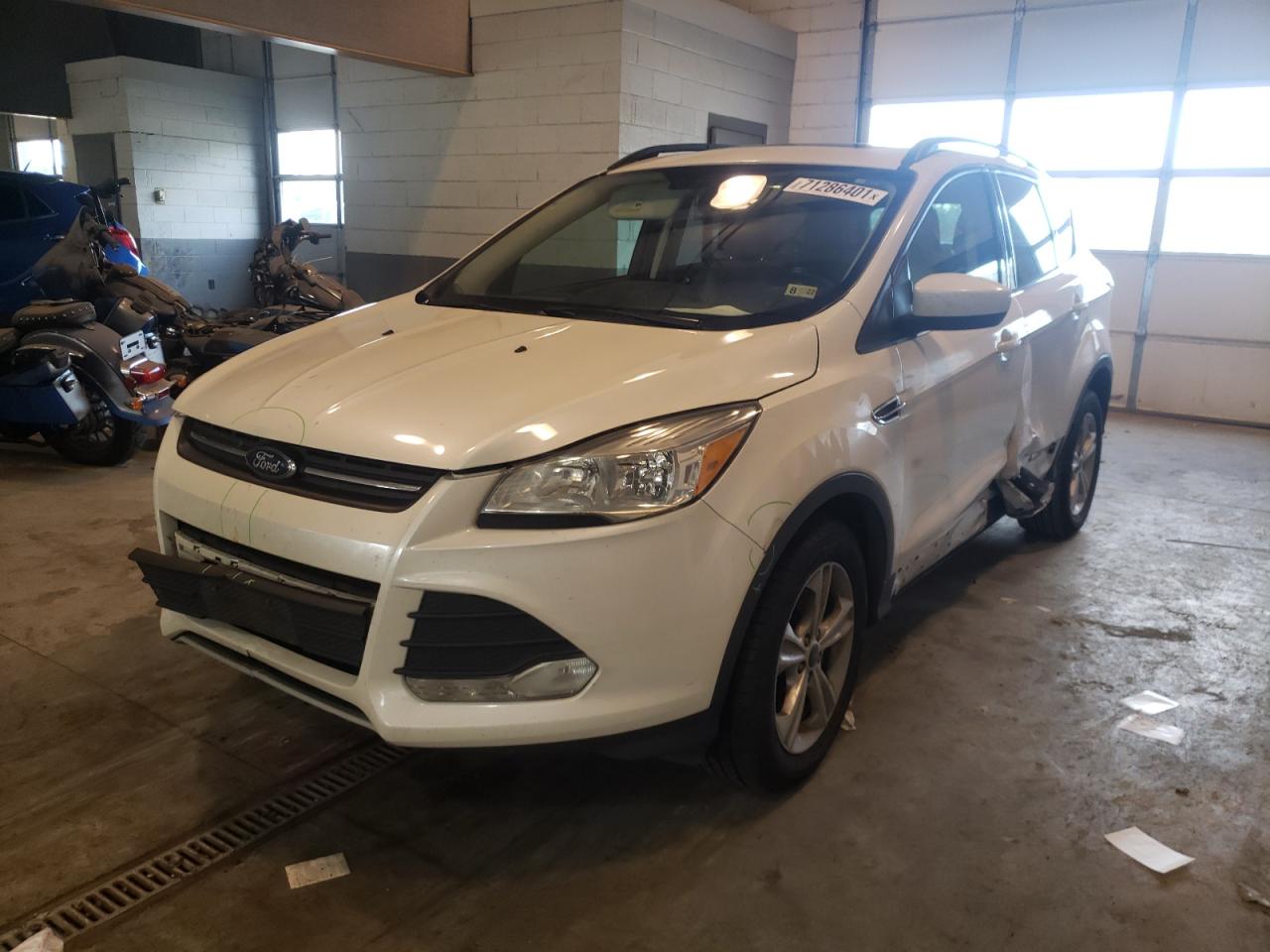 Photo 2 from auction – 2016 FORD ESCAPE SE with VIN 1FMCU0G93GUA92256