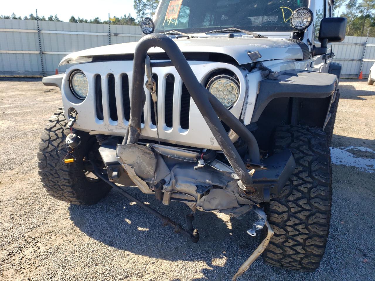 Photo 9 from auction – 2011 JEEP WRANGLER U with VIN 1J4BA5H10BL568633