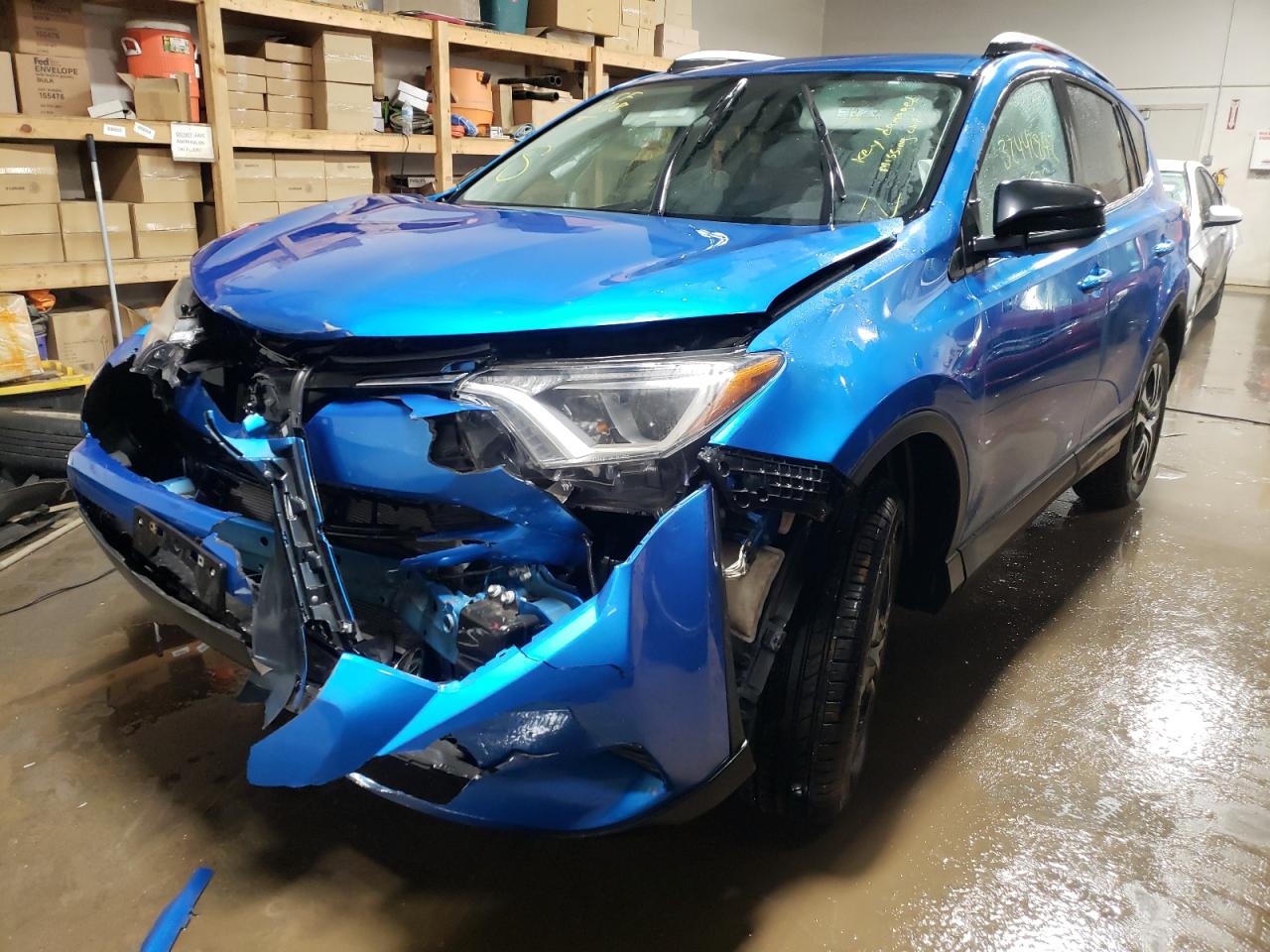 Photo 2 from auction – 2017 TOYOTA RAV4 LE with VIN 2T3BFREV8HW567449