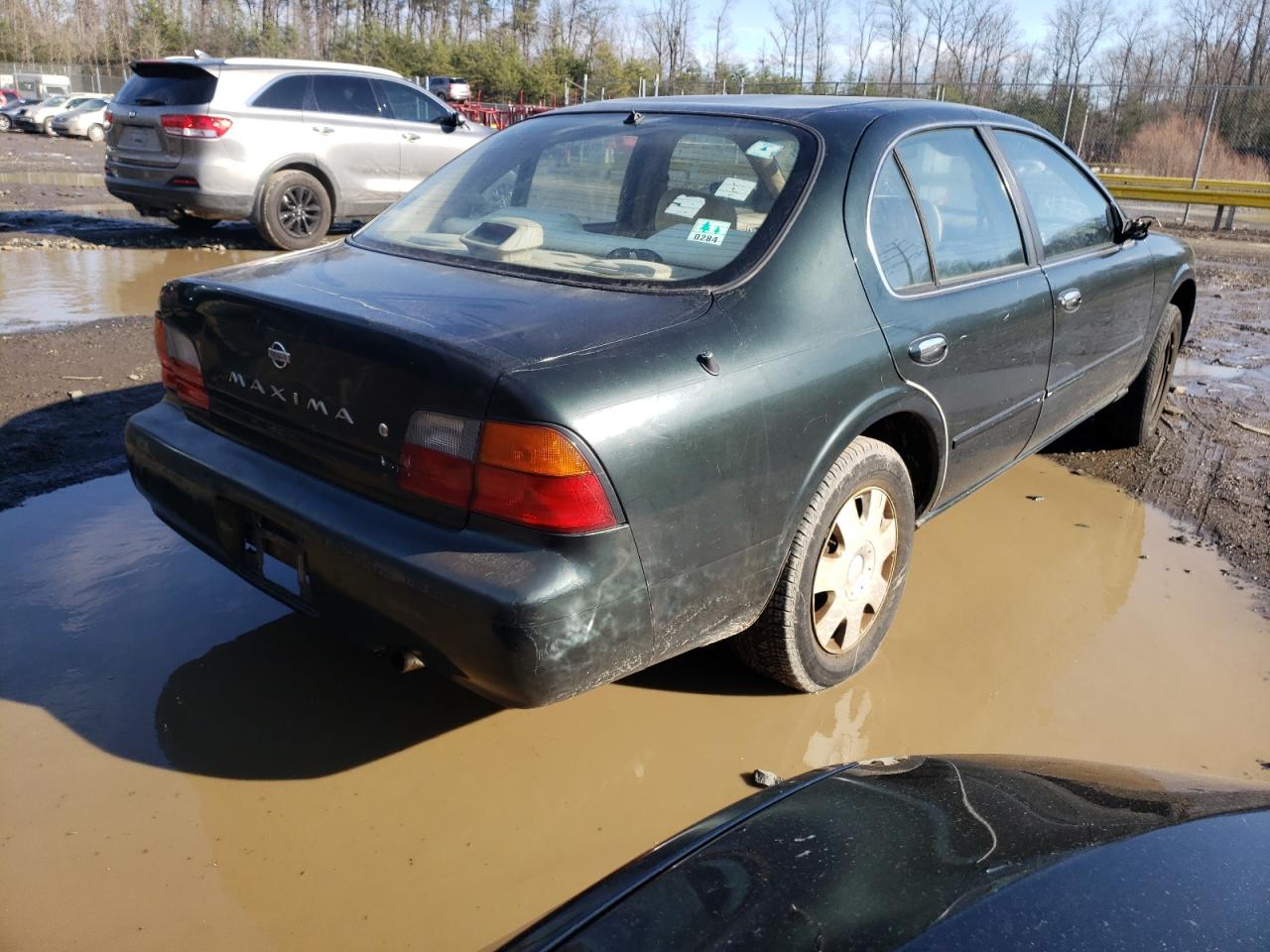 Photo 4 from auction – 1996 NISSAN MAXIMA GLE with VIN JN1CA21D3TT720728