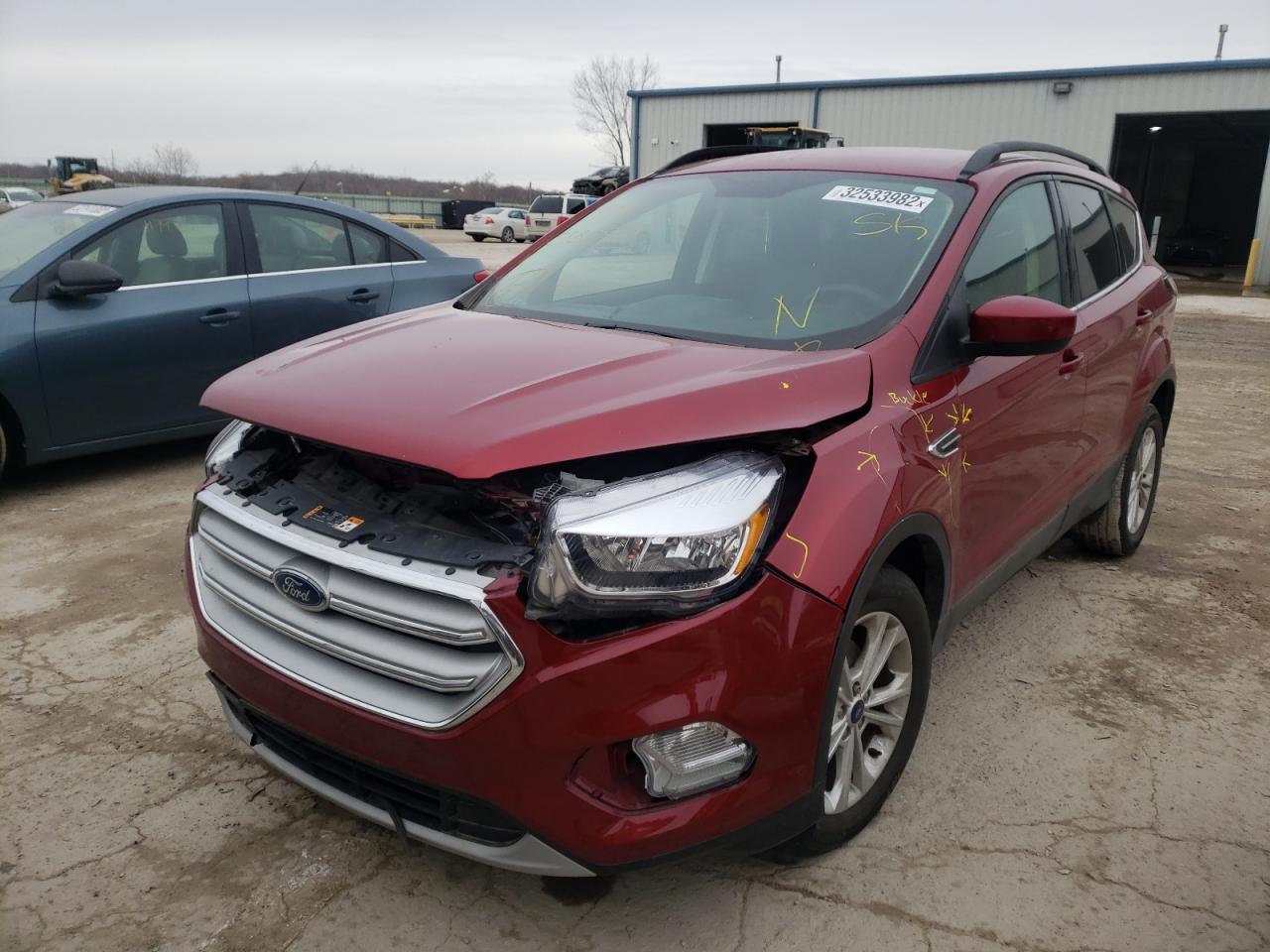Photo 2 from auction – 2018 FORD ESCAPE SE with VIN 1FMCU0GD4JUC58019