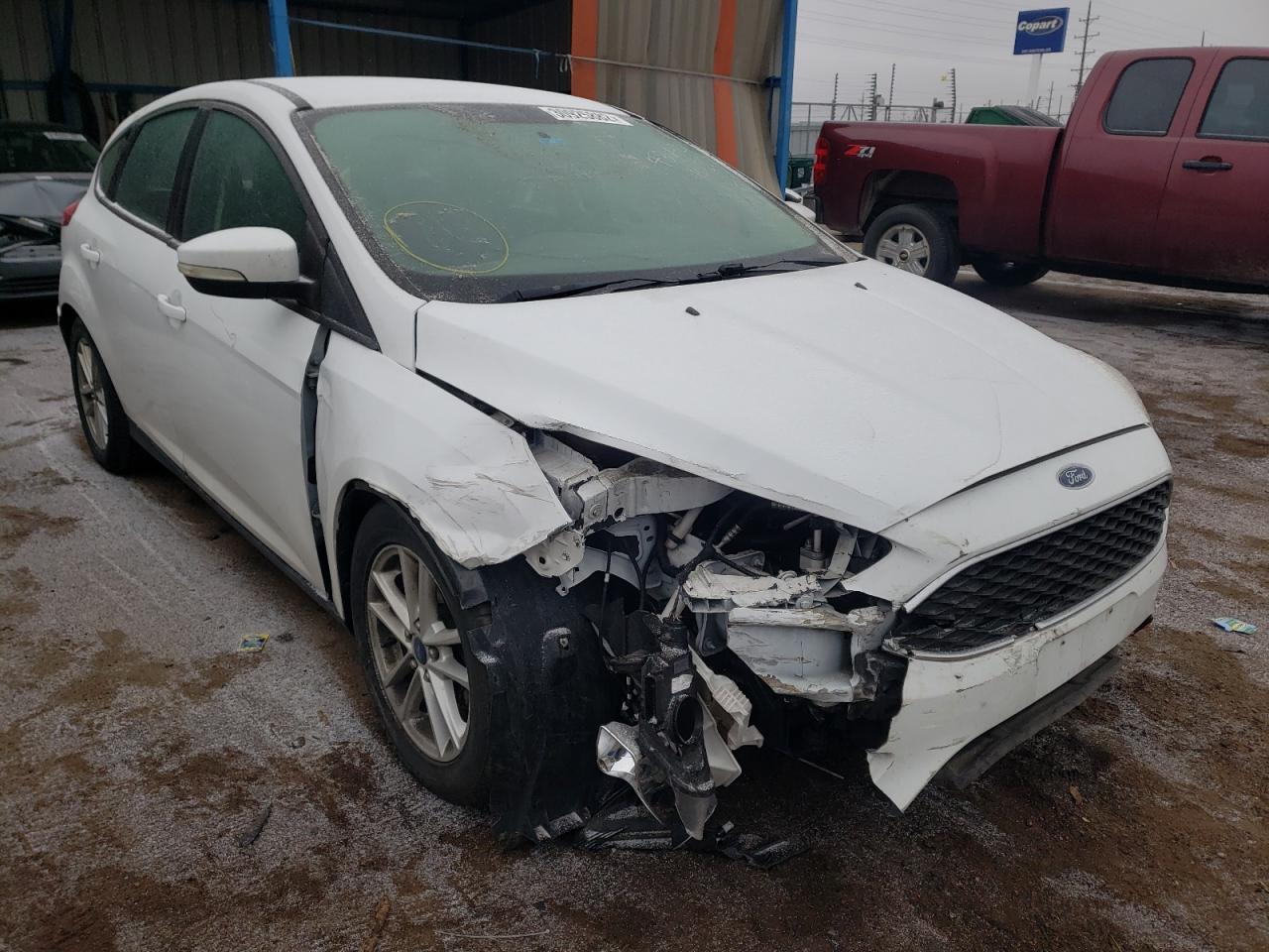 FORD FOCUS SE 2015 with VIN 1FADP3K25FL202777 - Photo from auction