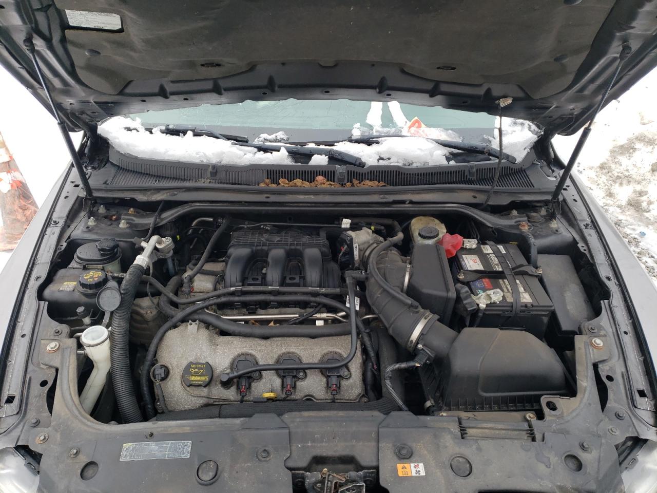 Photo 7 from auction – 2011 FORD TAURUS SE with VIN 1FAHP2DW7BG178058