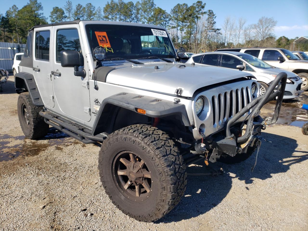 JEEP WRANGLER U 2011 with VIN 1J4BA5H10BL568633 - Photo from auction