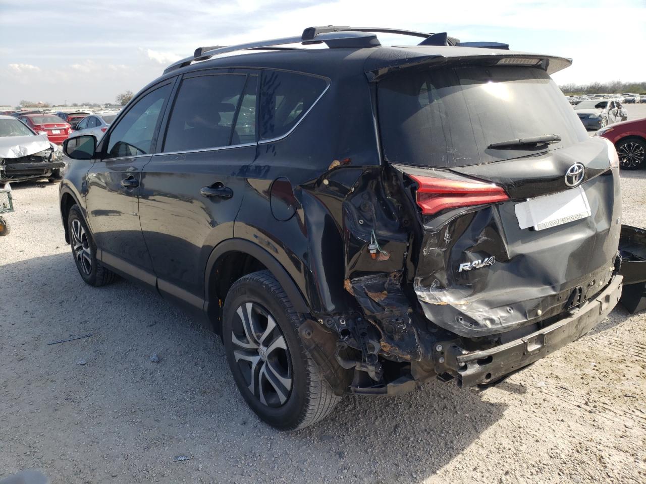 Photo 3 from auction – 2018 TOYOTA RAV4 LE with VIN 2T3ZFREV3JW422890