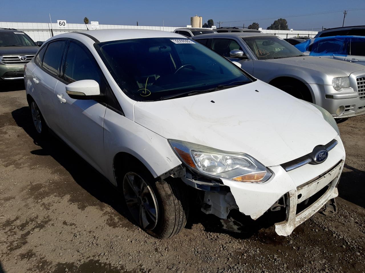 FORD FOCUS SE 2014 with VIN 1FADP3F29EL260545 - Photo from auction