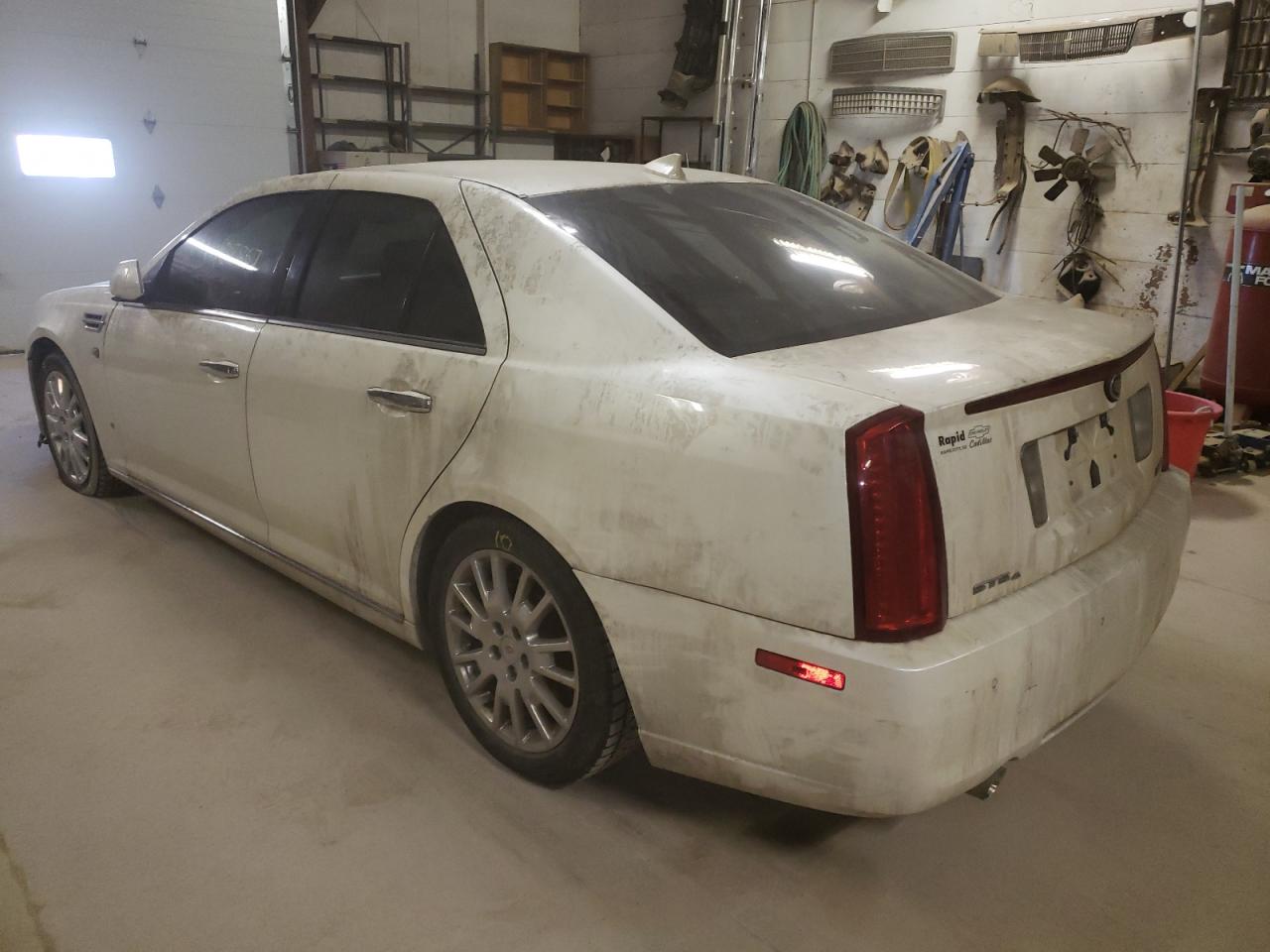 Photo 3 from auction – 2010 CADILLAC STS with VIN 1G6DU6EA2A0102205