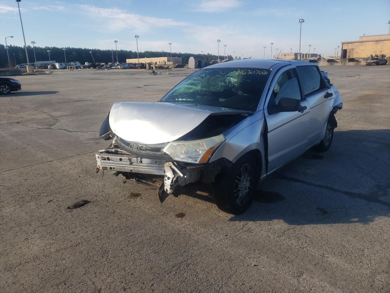Photo 2 from auction – 2011 FORD FOCUS SE with VIN 1FAHP3FN7BW184989