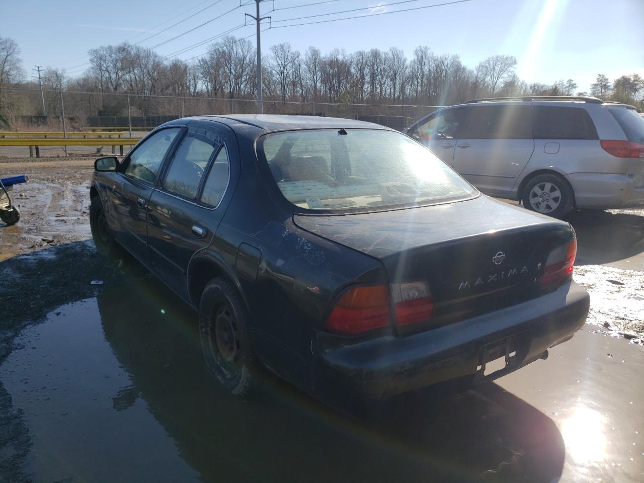 Photo 3 from auction – 1996 NISSAN MAXIMA GLE with VIN JN1CA21D3TT720728