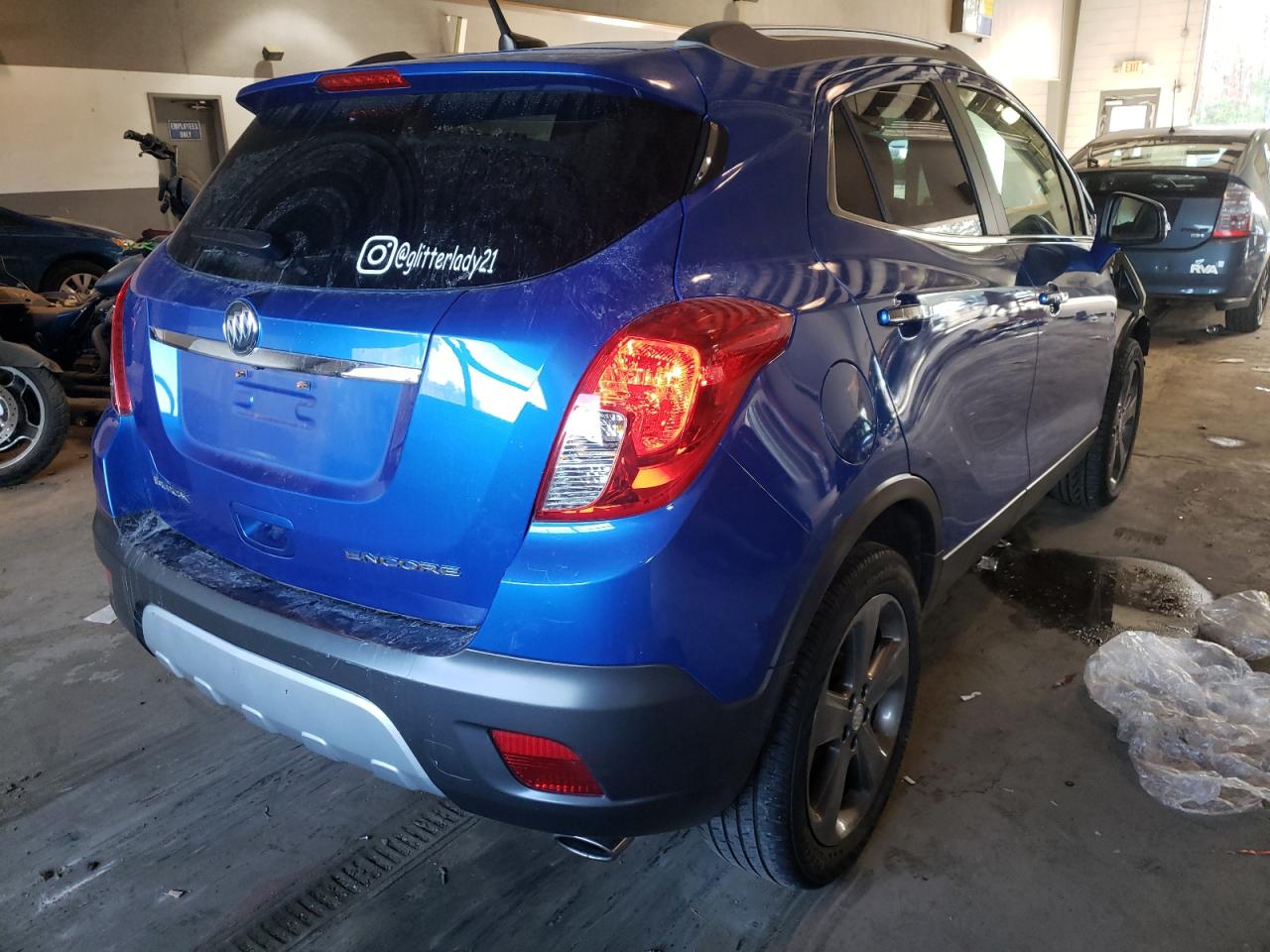 Photo 4 from auction – 2014 BUICK ENCORE with VIN KL4CJCSB4EB588646