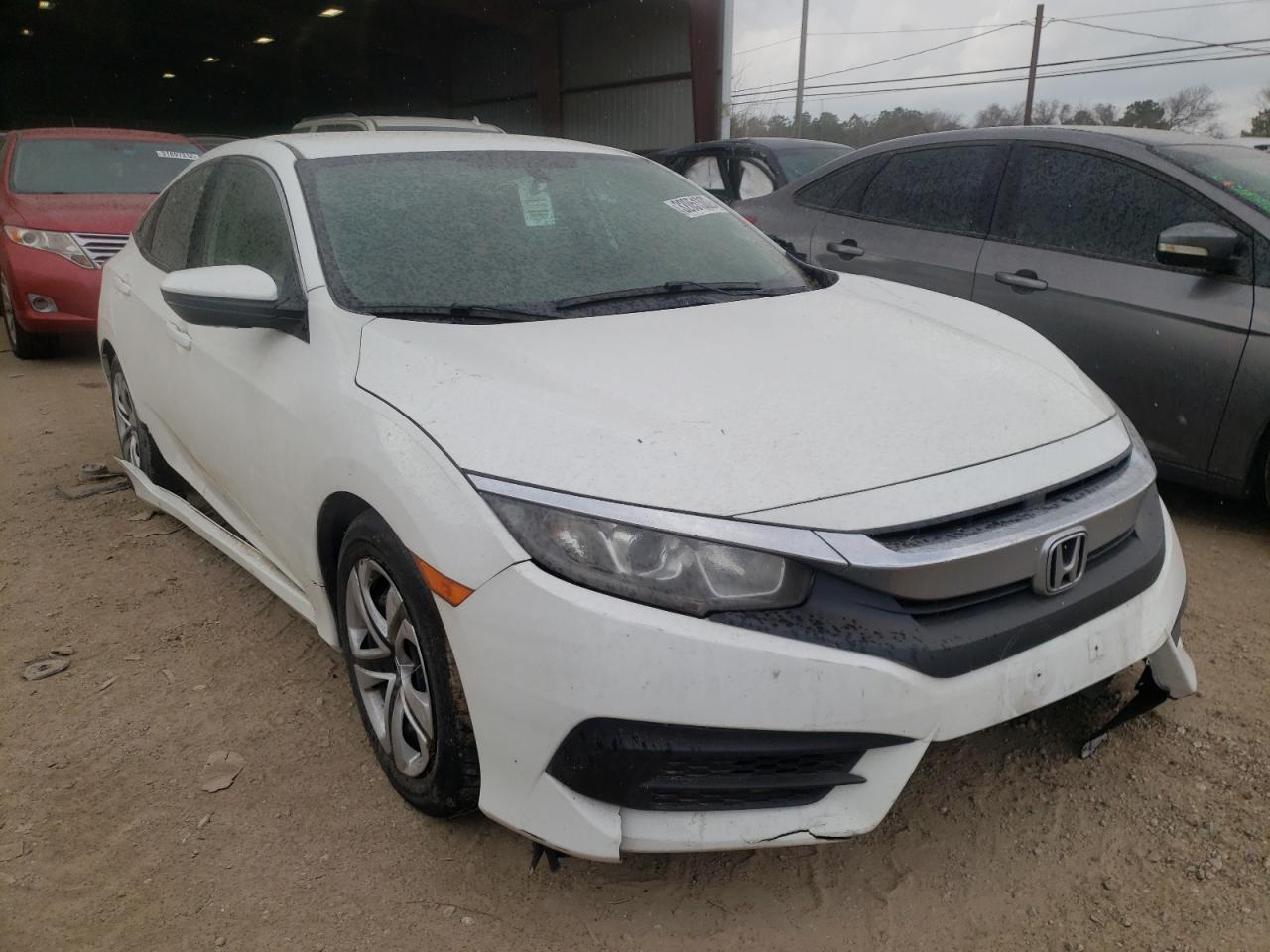 HONDA CIVIC LX 2018 with VIN 19XFC2F53JE204476 - Photo from auction