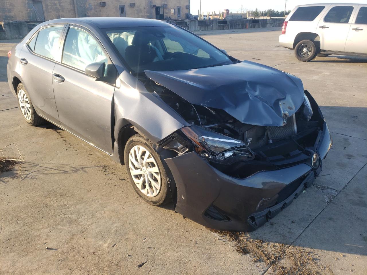 TOYOTA COROLLA L 2019 with VIN 5YFBURHE1KP939880 - Photo from auction