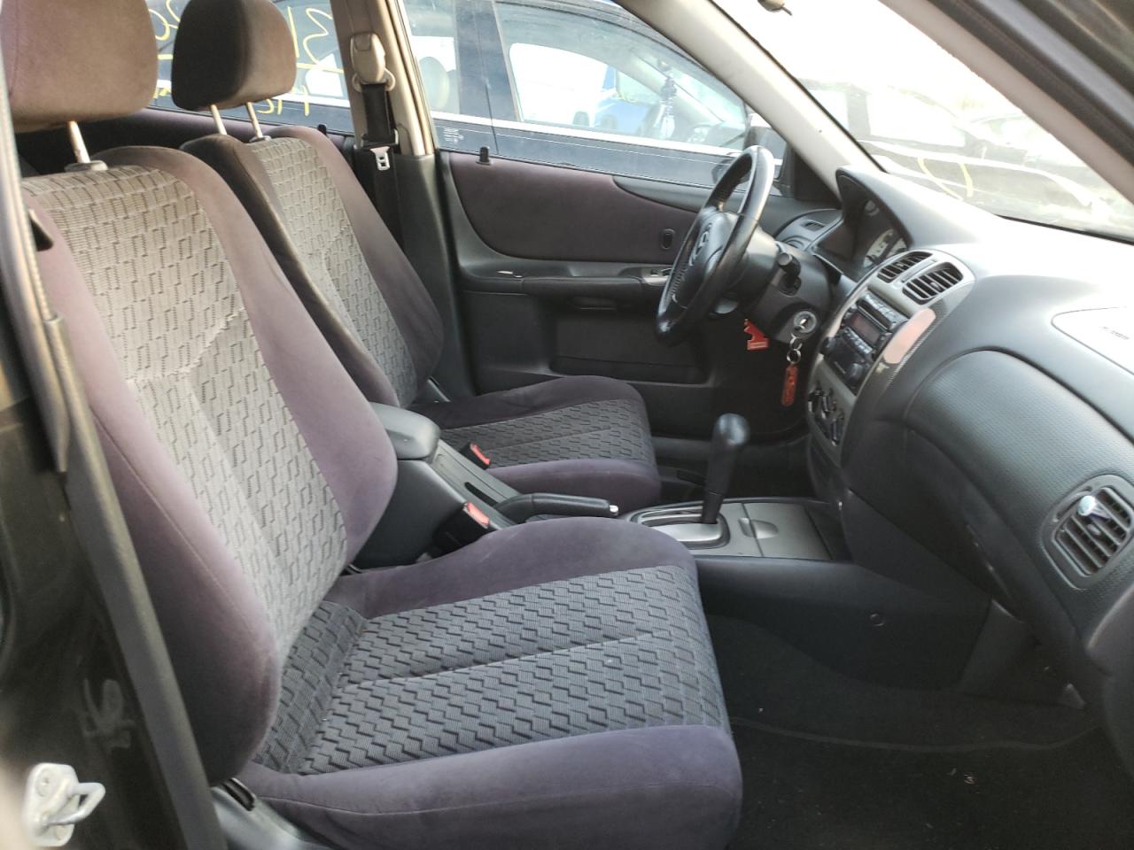 Photo 5 from auction – 2002 MAZDA PROTEGE PR with VIN JM1BJ245721589956