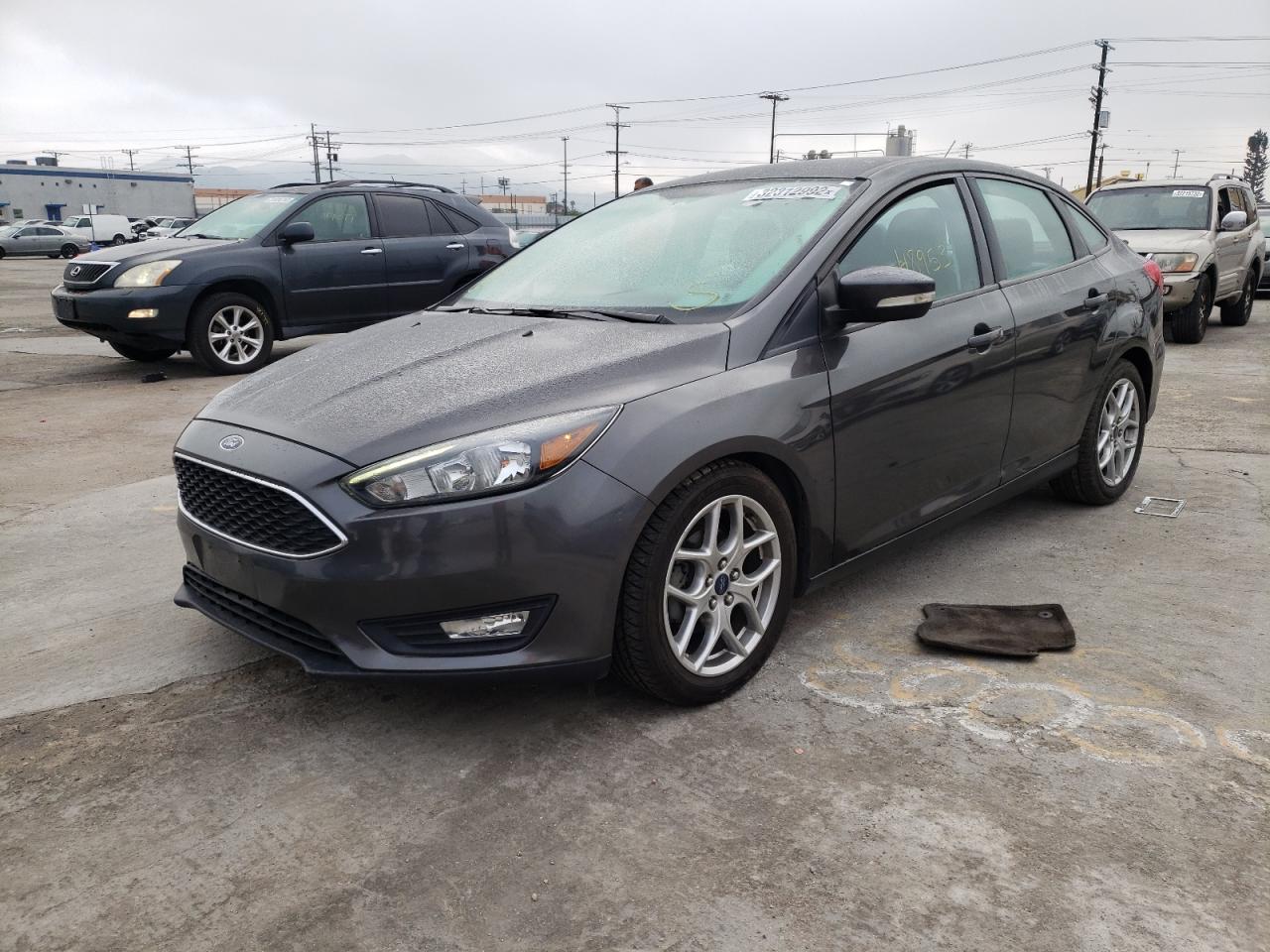 Photo 2 from auction – 2015 FORD FOCUS SE with VIN 1FADP3F20FL306622