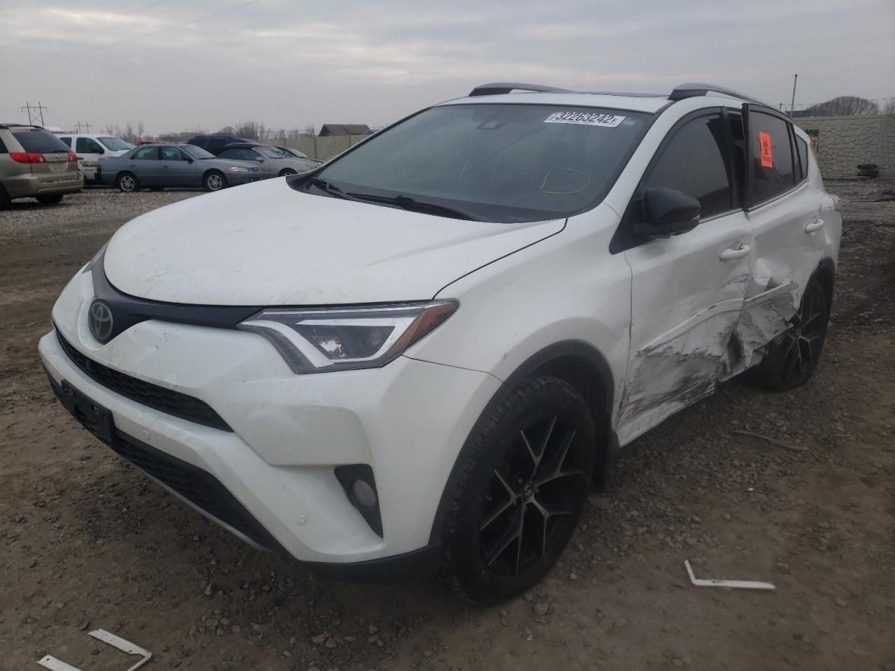 Photo 2 from auction – 2018 TOYOTA RAV4 SE with VIN JTMJFREV6JJ232416