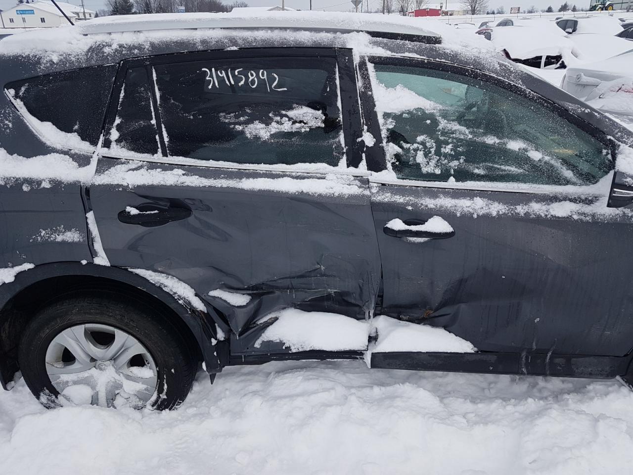 Photo 9 from auction – 2013 TOYOTA RAV4 LE with VIN 2T3BFREV0DW122729