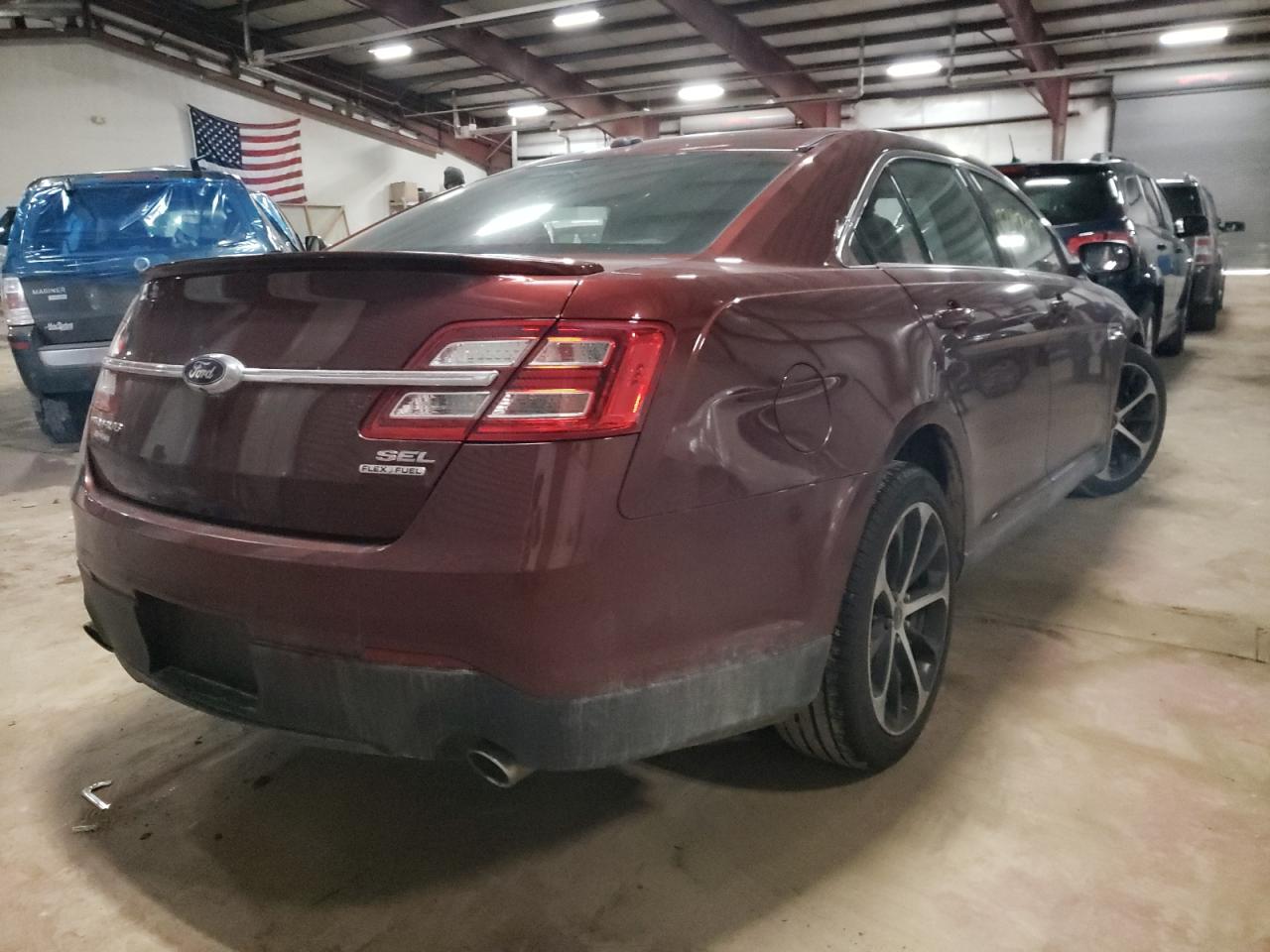 Photo 4 from auction – 2015 FORD TAURUS SEL with VIN 1FAHP2E83FG161554
