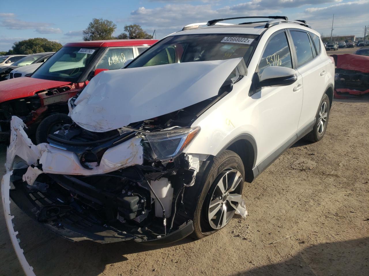 Photo 2 from auction – 2017 TOYOTA RAV4 XLE with VIN JTMWFREVXHD104906