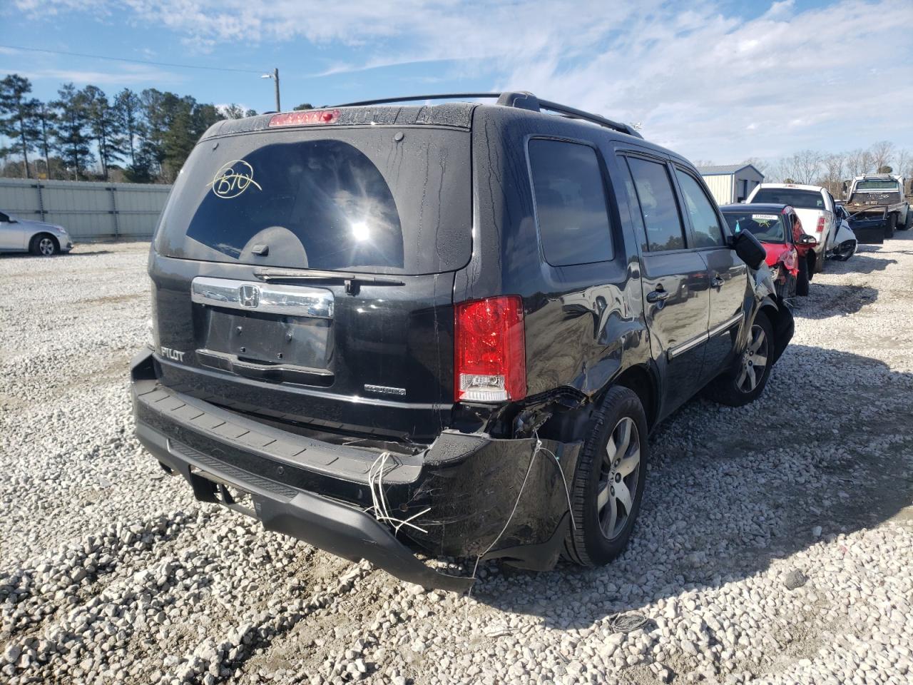 Photo 4 from auction – 2014 HONDA PILOT TOUR with VIN 5FNYF3H9XEB012770
