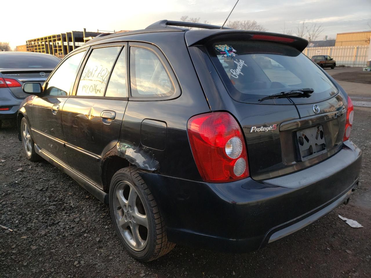 Photo 3 from auction – 2002 MAZDA PROTEGE PR with VIN JM1BJ245721589956