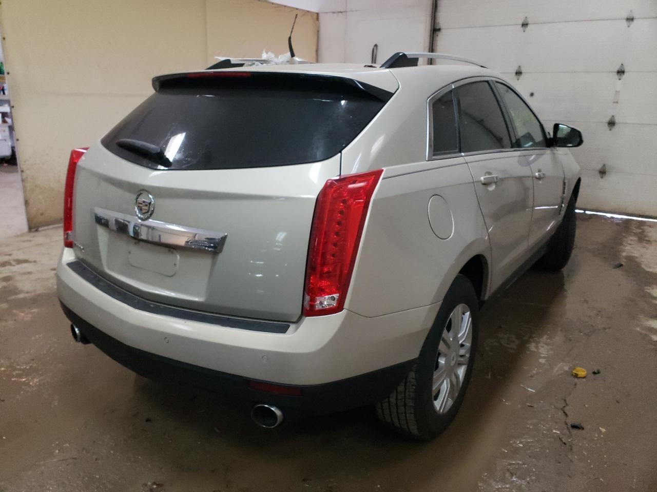 Photo 4 from auction – 2011 CADILLAC SRX LUXURY with VIN 3GYFNAEY9BS665016
