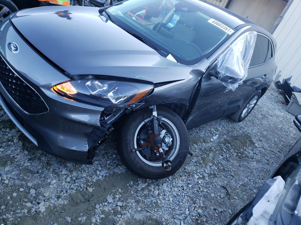 Photo 9 from auction – 2021 FORD ESCAPE SE with VIN 1FMCU0G64MUA50132